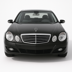 1:24 Mercedes-Benz E-Class W211 (2002–2009) diecast model car in black – detailed front view with chrome grille and classic sedan styling.