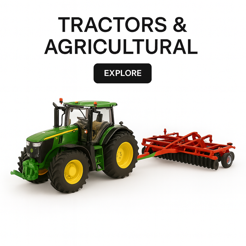 John Deere diecast tractor model with red agricultural cultivator on white background