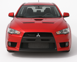 Front view of a red Mitsubishi Lancer Evolution X, a 2020s performance sedan featuring a hood scoop and aggressive front fascia.