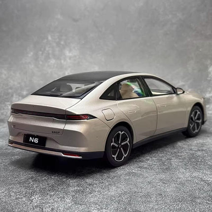 Original Manufacturer Nissan N6 2026 1:18 Diecast Model Car - studio product photo of the scale model
