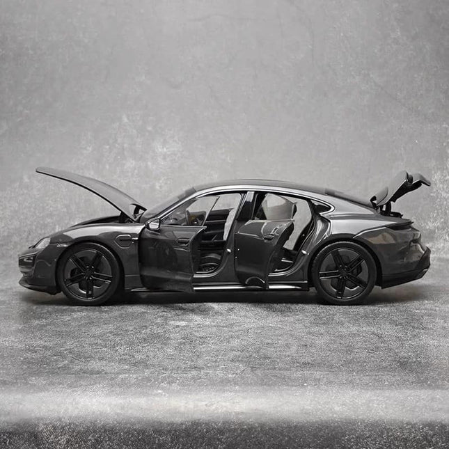 Norev Porsche Taycan Turbo S 2024 1:18 Diecast Model Car - studio product photo of the scale model