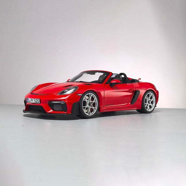 Norev Porsche 718 Silver 1:18 Diecast Model Car - studio product photo of the scale model