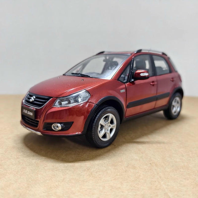 Original Suzuki SX4 Blue 1:18 Diecast Model Car - studio product photo of the scale model