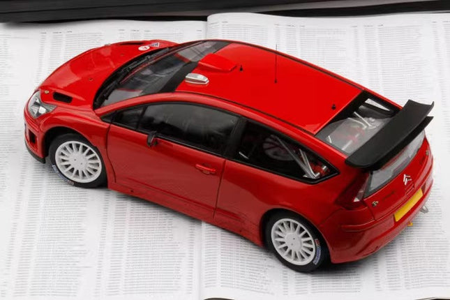 AutoArt Citroën C4 WRC Senna Tribute Red 1:18 Diecast Model Car - studio product photo of the scale model