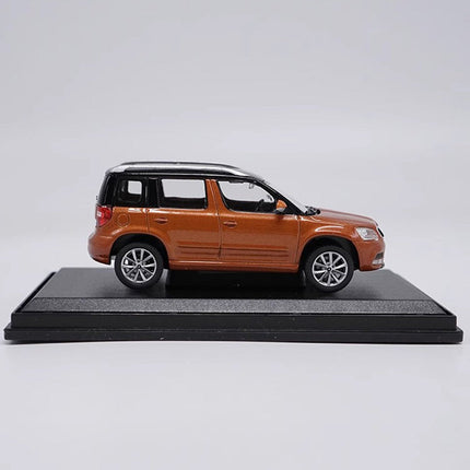 Original Skoda Yeti City Edition Orange 1:43 Diecast Model Car - studio product photo of the scale model