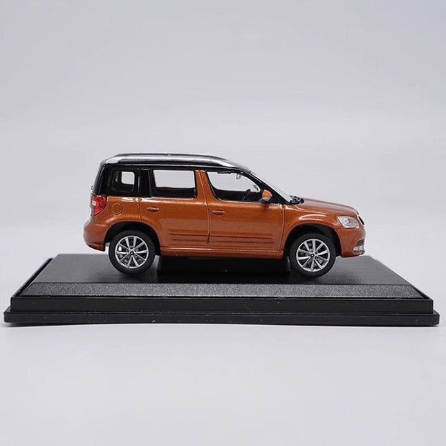 Original Skoda Yeti City Edition Orange 1:43 Diecast Model Car - studio product photo of the scale model
