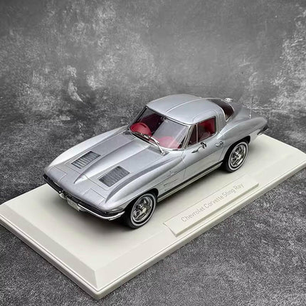 Norev Chevrolet Corvette Sting Ray 1963 Silver 1:18 Diecast Model Car - studio product photo of the scale model
