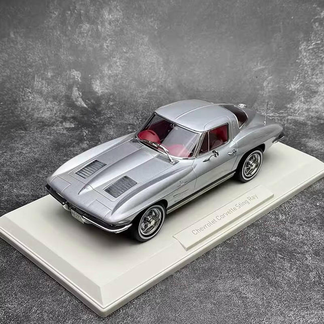 Norev Chevrolet Corvette Sting Ray 1963 Silver 1:18 Diecast Model Car - studio product photo of the scale model