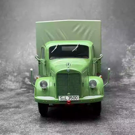 Schuco Mercedes-Benz L3500 Truck Transporter Green 1:18 Diecast Model Truck - studio product photo of the scale model