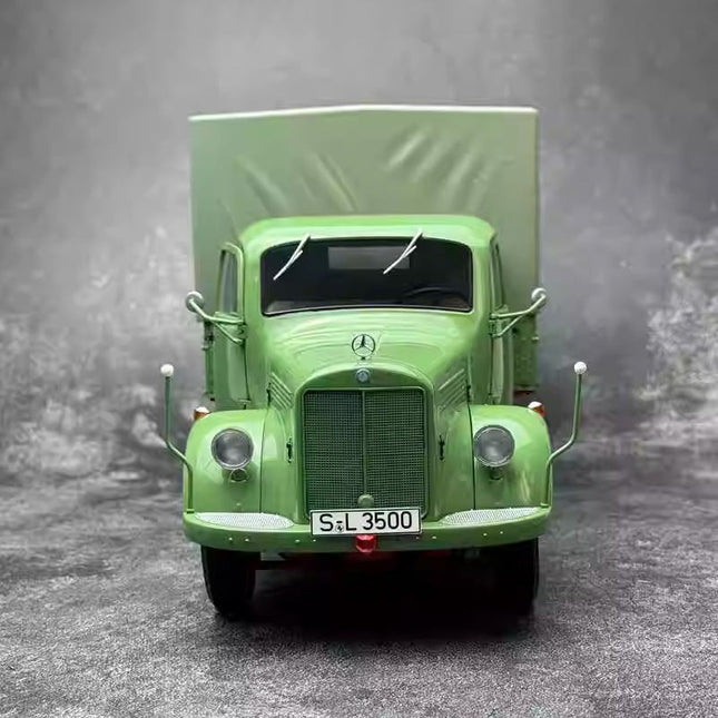Schuco Mercedes-Benz L3500 Truck Transporter Green 1:18 Diecast Model Truck - studio product photo of the scale model
