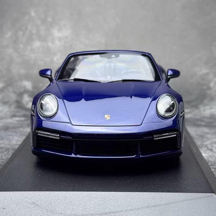 Minichamps Porsche 911 (992) Turbo S Cabriolet 2020 1:18 Diecast Model Car - studio product photo of the scale model