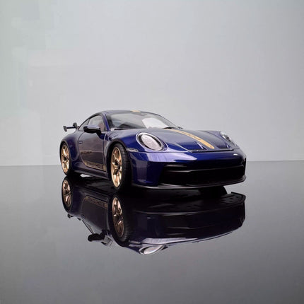 Norev Porsche 911 Carrera 4S Cabriolet 2021 1:18 Diecast Model Car - studio product photo of the scale model