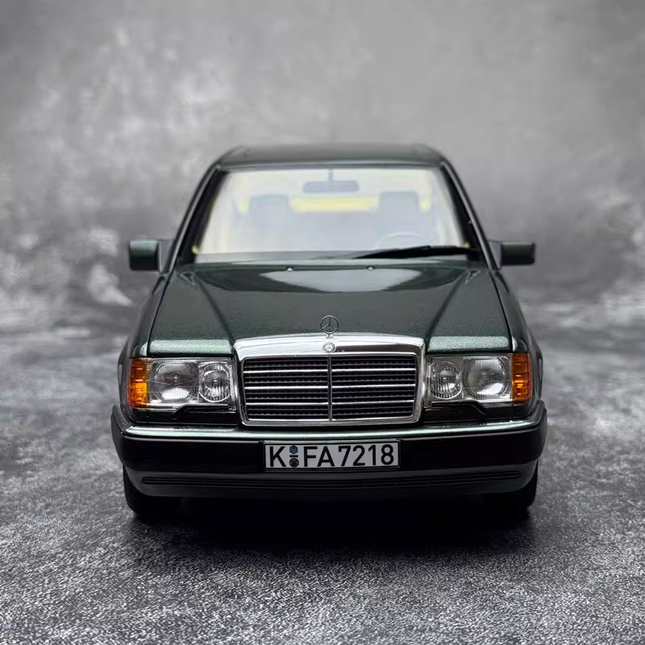Norev Mercedes-Benz 230E W124 1990 1:18 Diecast Model Car - studio product photo of the scale model