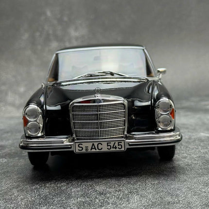 Norev Mercedes-Benz 280 SE 1968 (W108) Black 1:18 Diecast Model Car - studio product photo of the scale model