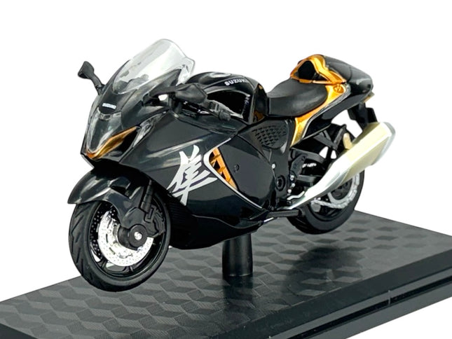1:18 scale diecast model Suzuki motorcycle in black and gold on display stand