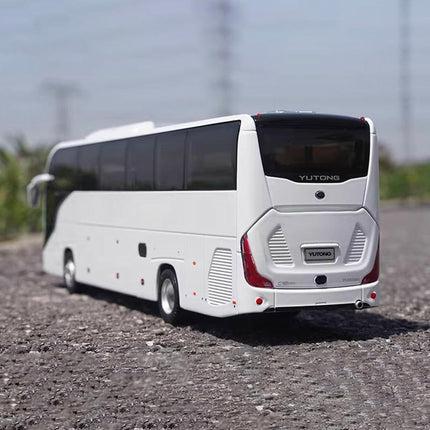 Original Manufacturer Yutong C12PRO White Bus 1:42 Diecast Model Bus - studio product photo of the scale model