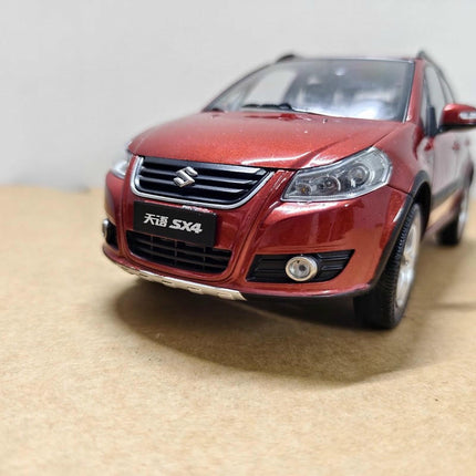 Original Suzuki SX4 Blue 1:18 Diecast Model Car - detailed collectible replica