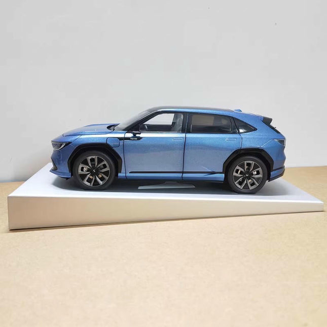 Original Manufacturer Honda P7 2025 Blue 1:18 Diecast Model Car - studio product photo of the scale model