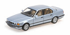 1:18 scale diecast model car, silver sedan with detailed interior on white background