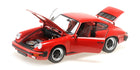 Red Porsche diecast model car 1:18 scale with open doors, hood, and trunk