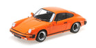 1:18 scale orange Porsche diecast model car with black trim details on white background