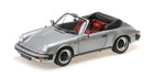 1:18 scale silver Porsche convertible diecast model car with red interior