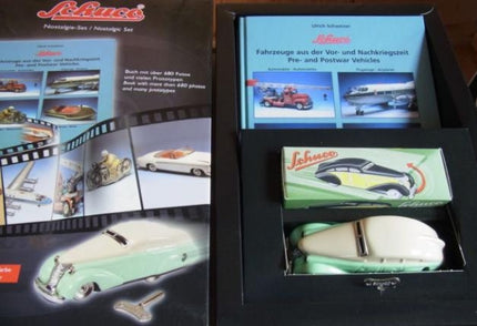 Schuco nostalgia set with diecast model car, collector's box, and illustrated book
