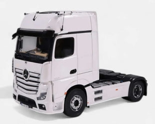 1:18 scale white Mercedes-Benz diecast model truck cab on white background