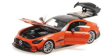 1:18 scale orange diecast model car with open doors, hood, and trunk, sports detailing
