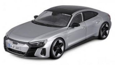 1:18 scale silver diecast model car with black roof, detailed wheels, and sporty design