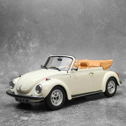 Norev Volkswagen Beetle 1303 Cabriolet Yellow 1:18 Diecast Model Car - studio product photo of the scale model
