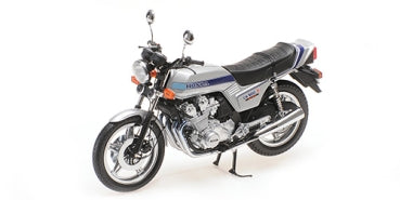 1:18 scale diecast model of a classic silver motorcycle with black seat and chrome details
