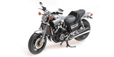 1:18 scale diecast model of a classic silver and black motorcycle on white background