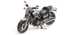 1:18 scale diecast model motorcycle in silver and black on white background