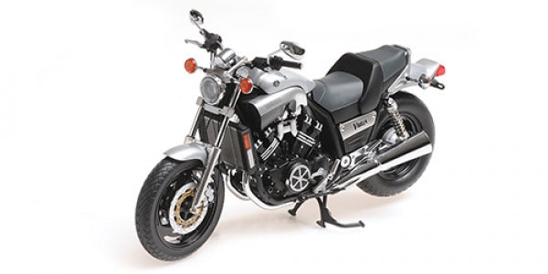 1:18 scale diecast model motorcycle in silver and black on white background