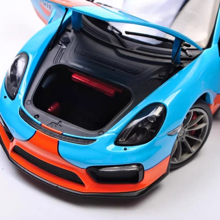 Schuco Porsche Cayman GT4 Gulf Edition 1:18 Diecast Model Car - showroom-quality model replica