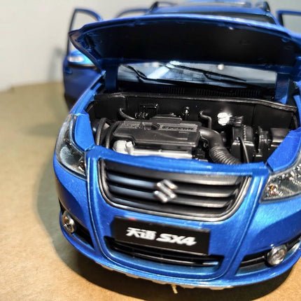 Original Suzuki SX4 Blue 1:18 Diecast Model Car - showroom-quality model replica