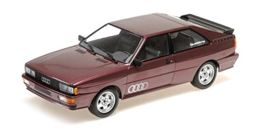 1:18 scale diecast model of maroon Audi coupe with detailed wheels and rear spoiler