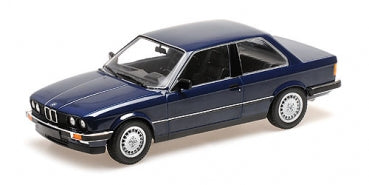 1:18 scale diecast model car, classic dark blue coupe with detailed wheels and trim