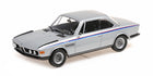 1:18 scale diecast BMW model car in silver with M stripes, classic coupe design