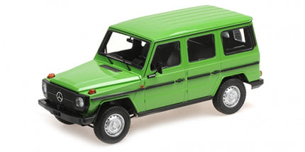 Green diecast Mercedes-Benz G-Class model car, 1:18 scale, detailed exterior.
