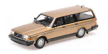 Gold diecast Volvo wagon 1:18 scale model car with detailed wheels and black interior