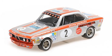 1:18 scale diecast vintage BMW race car model, silver with orange and racing decals