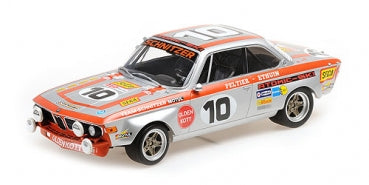 1:18 scale diecast BMW race car model, silver with orange racing stripes and decals