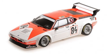 1:18 scale BMW M1 racing diecast model car, white and orange, detailed with racing decals