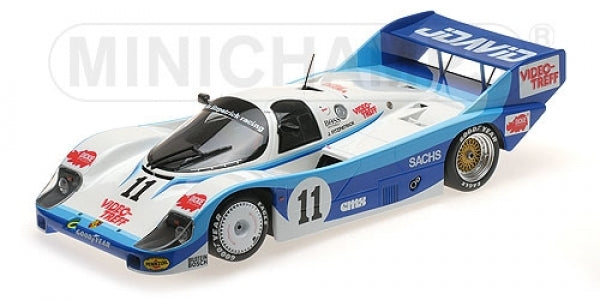 1:18 scale diecast model of a classic race car with blue and white livery, number 11
