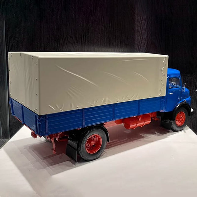Schuco Mercedes-Benz L911 Truck 1952 Blue 1:18 Diecast Model Truck - studio product photo of the scale model