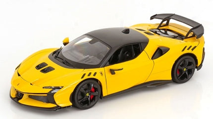 Yellow diecast model sports car with black roof, rear wing, and detailed accents