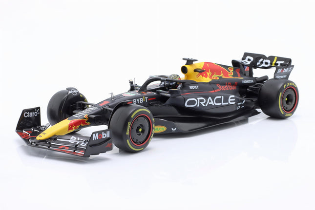 https://automodele.eu/environment/cache/images/productGfx_752436_0_0/18003-VERS-Red-Bull-Racing-RB19-1-Max-Verstappen-Winner-Abu-Dhabi-GP-Formula-1-F1-World-Champion-2023-Bburago-118.jpg