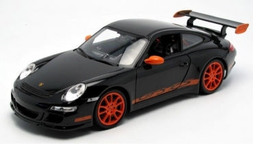 1:18 scale diecast black Porsche model car with orange wheels and rear spoiler